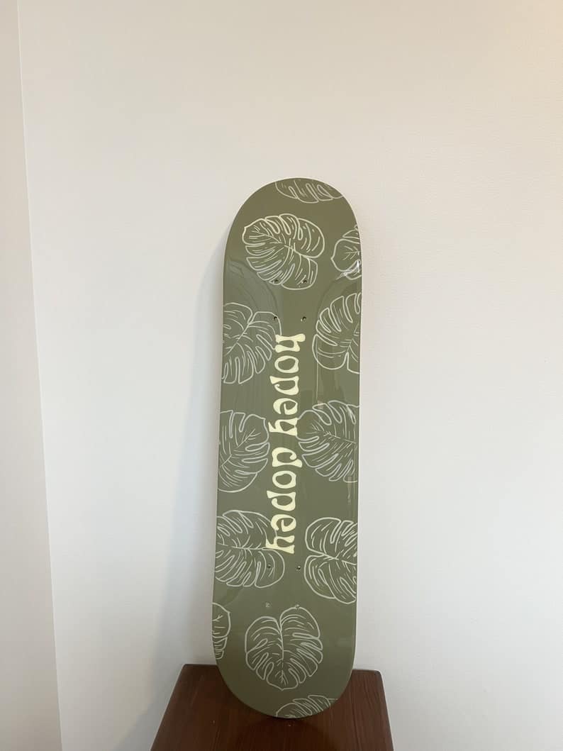 Monstera leaf pattern skateboard design