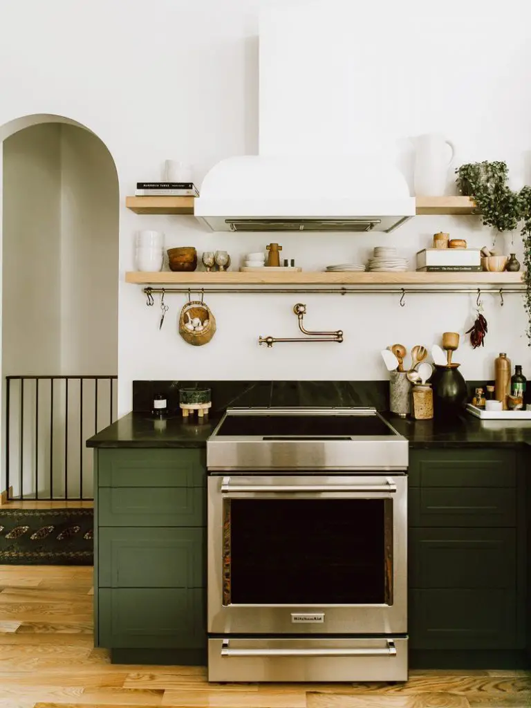 Green Kitchen Cabinet Black Countertop