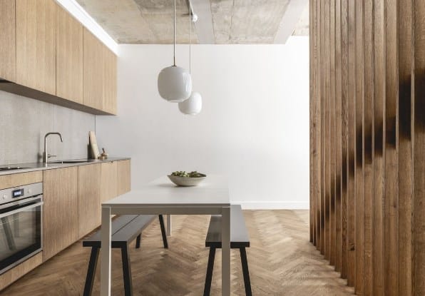 Minimalist Concrete Backsplash And Wooden Cabinet