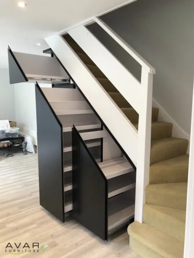 Integrated shelving unit with a pull-out stairway