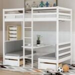 white bunk bed with a dual bench desk for kids