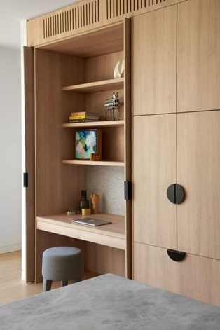 wooden cupboard with a sectioned off cloffice transformation 