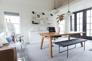 white garage office with wooden desk