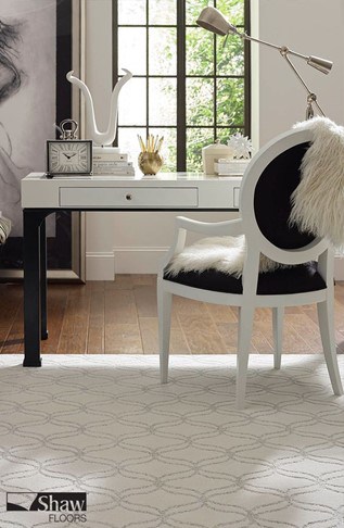 grey and white patterned rug 